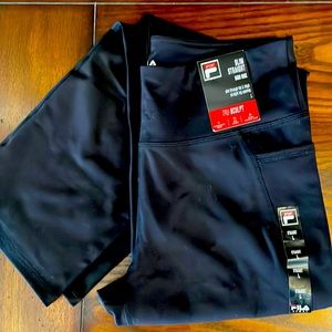 Women’s Fila Tru-Sculpt pants.  Skim through hip and thigh straight leg size L